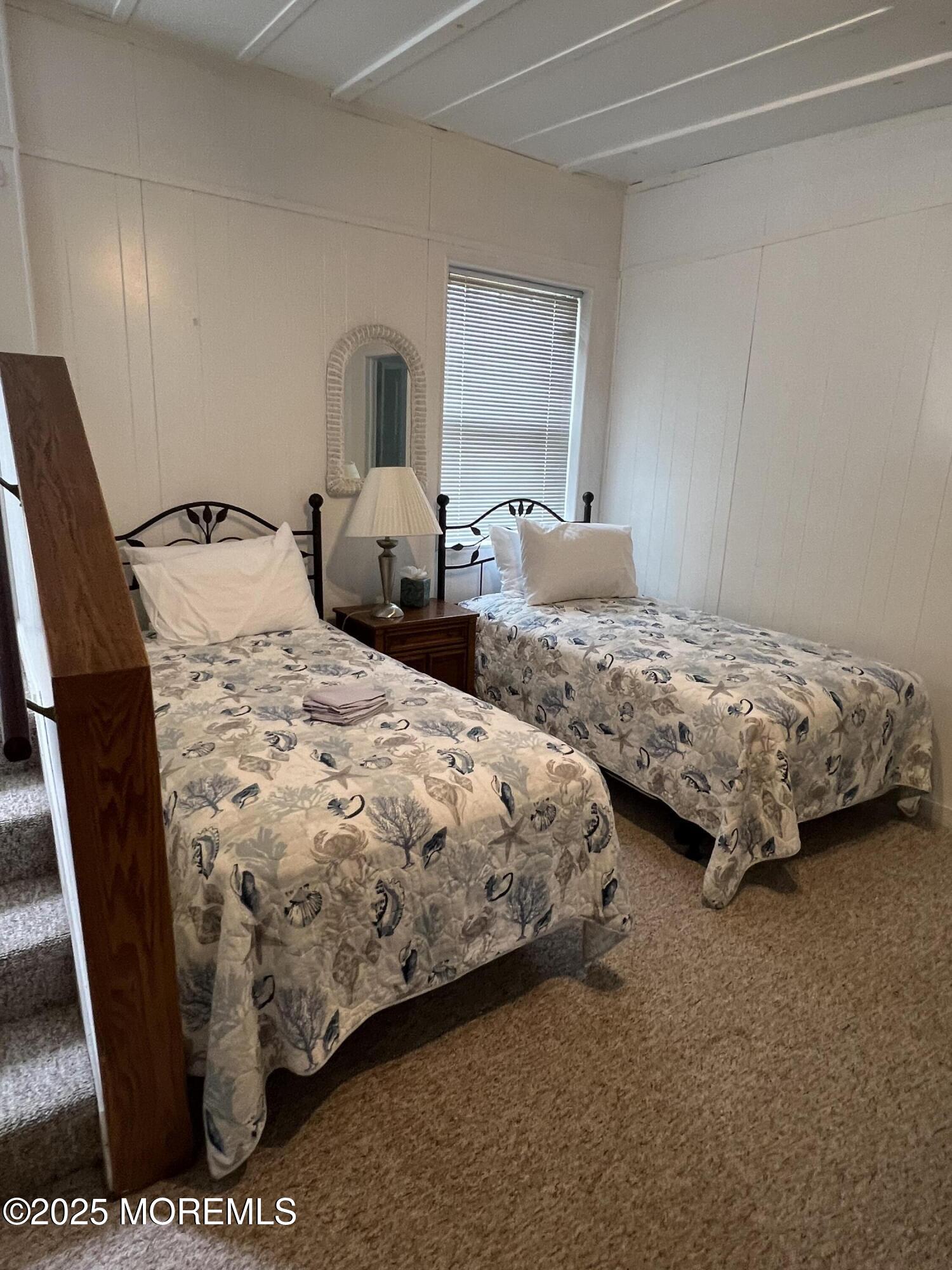 413 Morris Avenue Spring Lake, NJ 07762 - Photo 10 of 14 a bedroom with bed and window