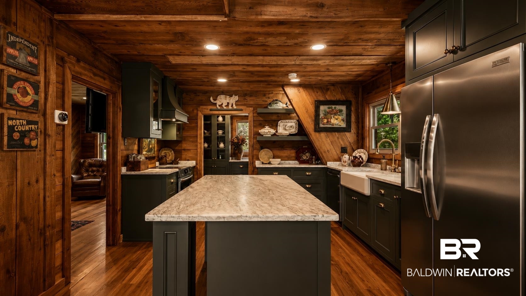 14587 Ridge Road Summerdale, AL 36580 - Photo 15 of 44 Kitchen featuring wood-paneled walls and ceiling, dark cabinetry, and wood-finish flooring