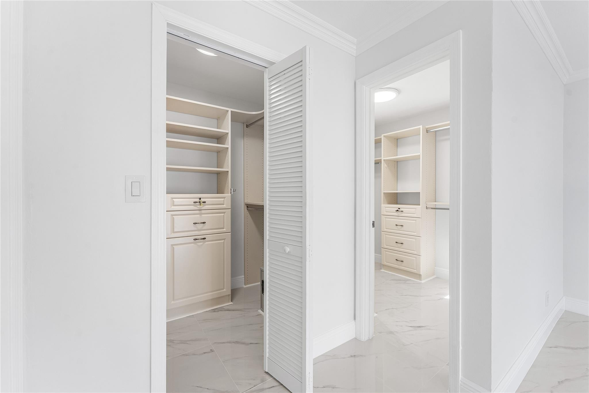 2443 Northeast 26th Street Lighthouse Point, FL 33064 - Photo 25 of 67 2 walk in closets in the primary bedroom