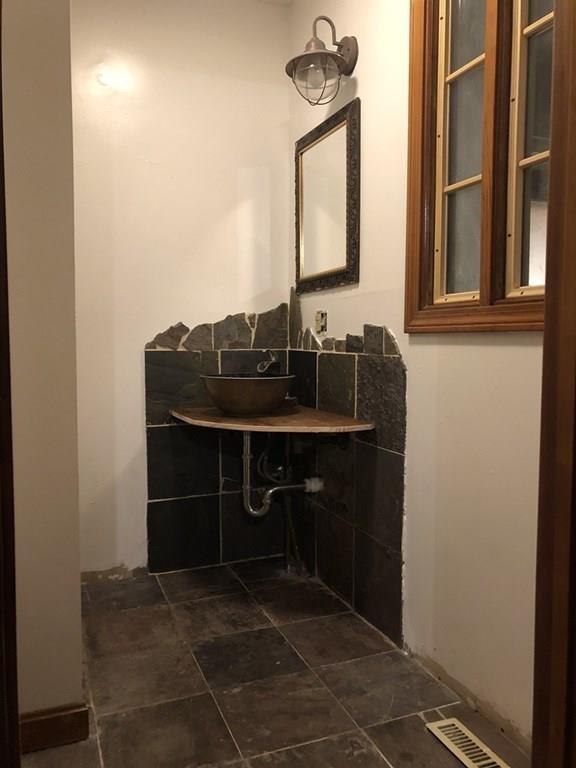 46 Littleville Road Huntington, MA 01050 - Photo 13 of 19 a bathroom with a sink and a mirror
