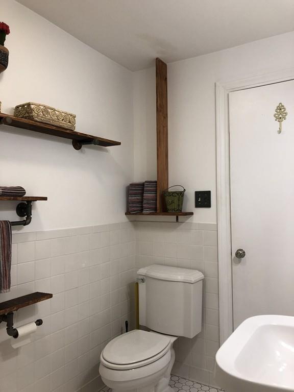 46 Littleville Road Huntington, MA 01050 - Photo 10 of 19 a bathroom with a toilet a sink and vanity