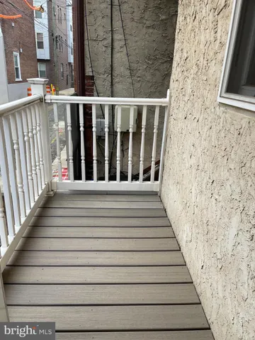 a balcony with stairs