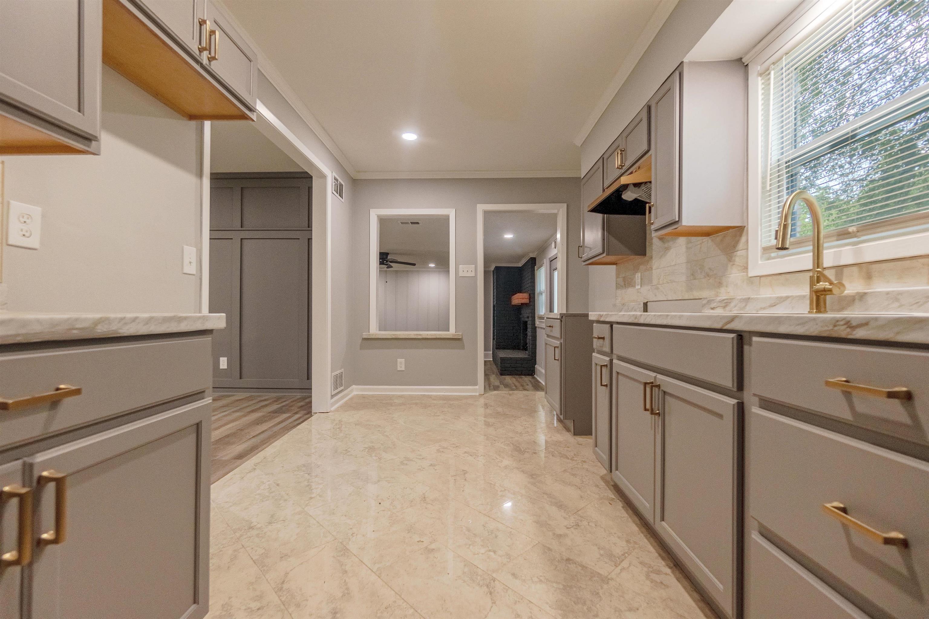 1011 Haledale Road Memphis, TN 38116 - Photo 12 of 25 a view of a kitchen with a sink