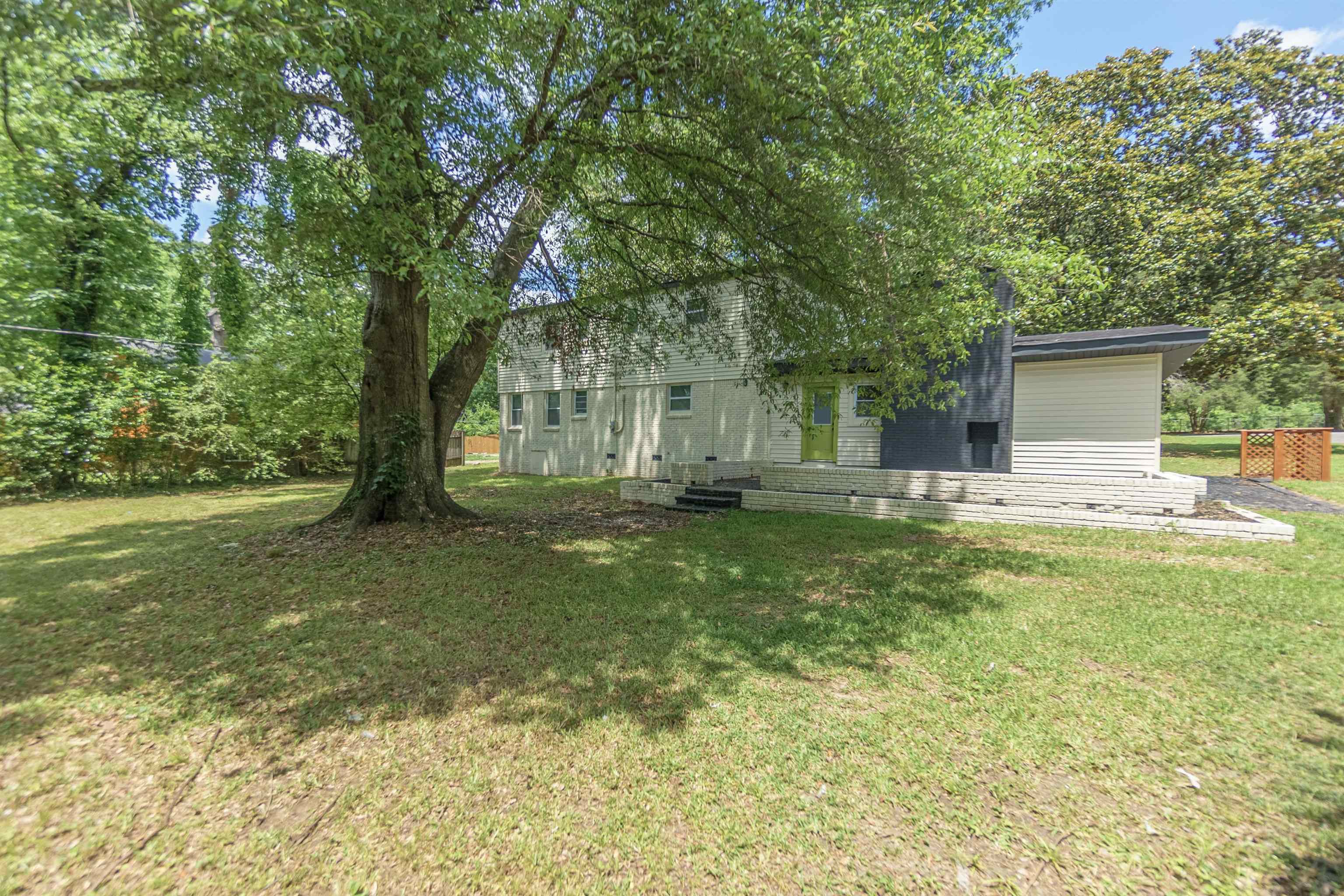 1011 Haledale Road Memphis, TN 38116 - Photo 24 of 25 a front view of a house with garden