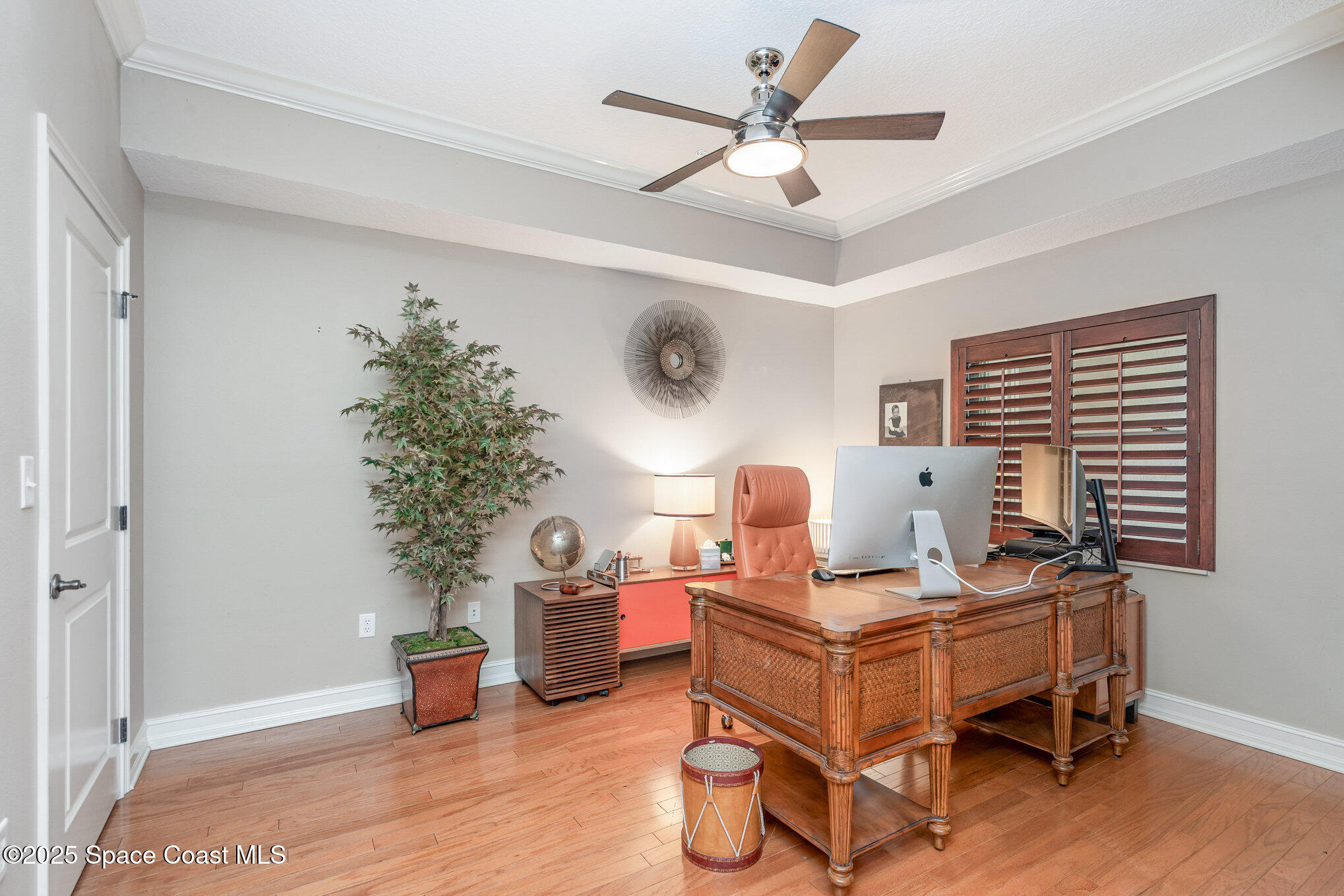 29 Riverside Drive, Unit 203 Cocoa, FL 32922 - Photo 16 of 33 a living room with furniture and a window