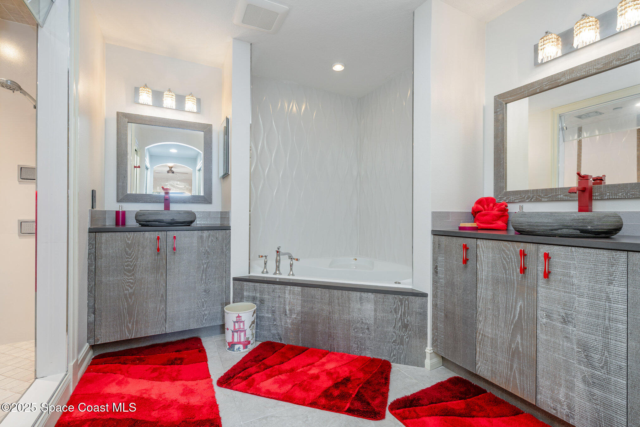 29 Riverside Drive, Unit 203 Cocoa, FL 32922 - Photo 21 of 33 a bedroom with a bed and a lamp