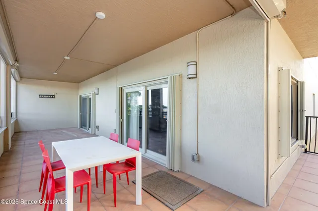 a view of a porch with furniture and a porch