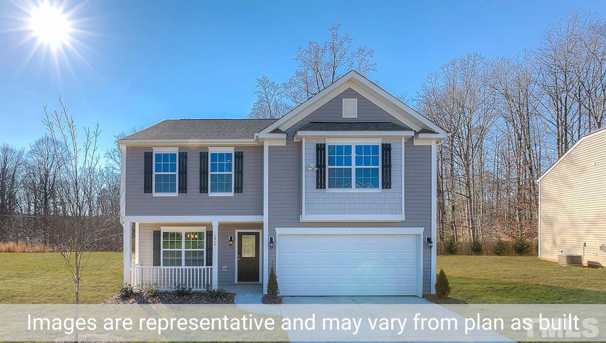 1006 Broadlands Way Graham, NC 27253 - Photo 1 of 25 a front view of a house with a yard