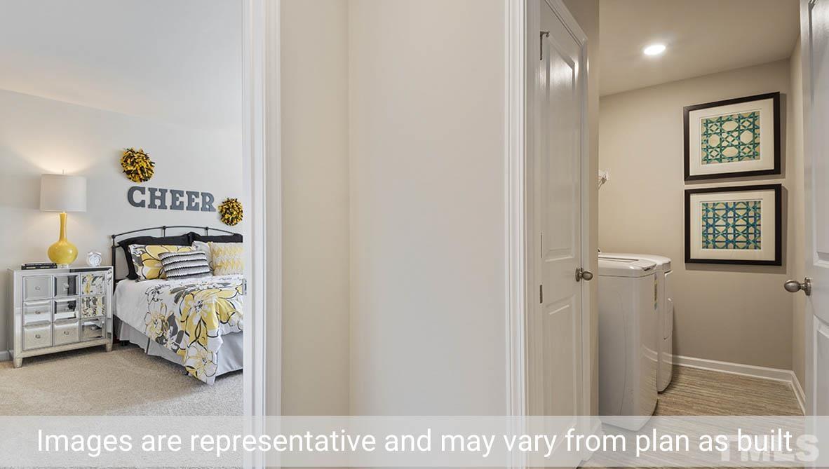 1006 Broadlands Way Graham, NC 27253 - Photo 17 of 25 a bed room with furniture and a window