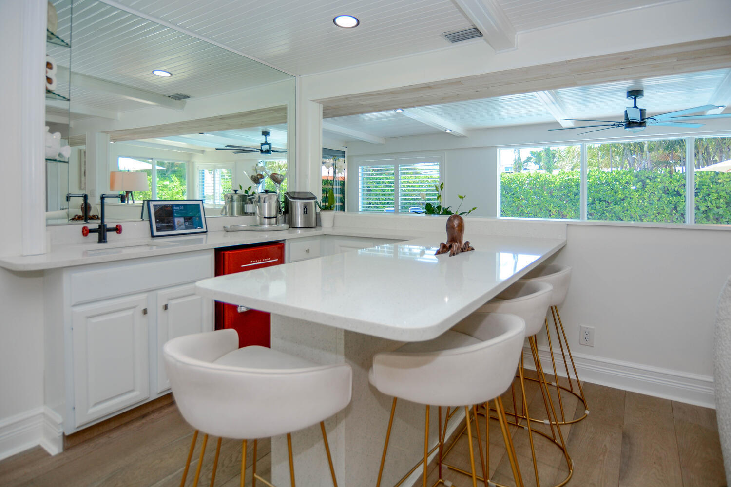 3396 Pebble Place Jupiter, FL 33469 - Photo 7 of 24 a dining room with furniture and a large window