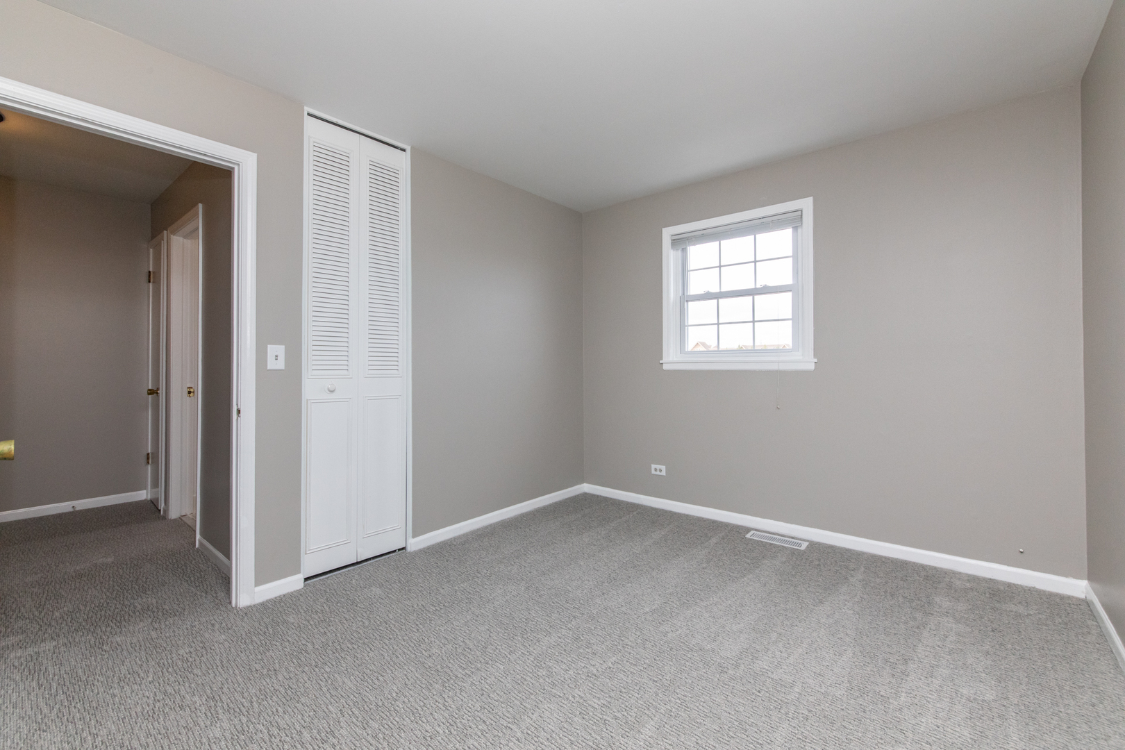 2148 Rugen Road, Unit B Glenview, IL 60026 - Photo 15 of 23 a view of an empty room with a window