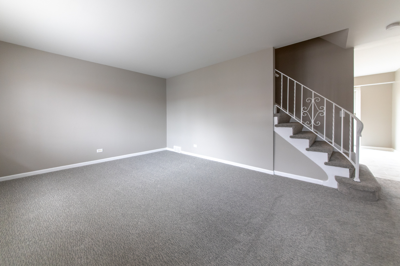 2148 Rugen Road, Unit B Glenview, IL 60026 - Photo 3 of 23 a view of an empty room with stairs