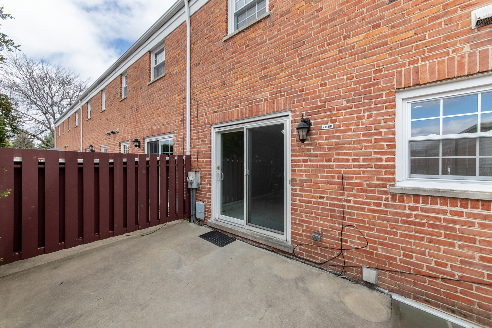 2148 Rugen Road, Unit B Glenview, IL 60026 - Photo 22 of 23 a view of a house with wooden fence