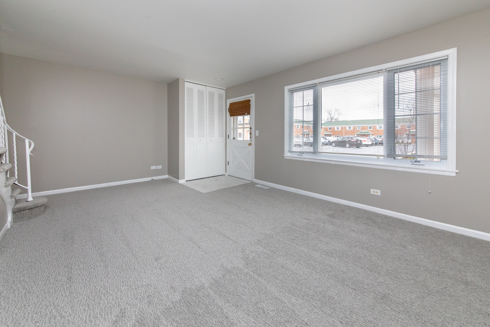 2148 Rugen Road, Unit B Glenview, IL 60026 - Photo 4 of 23 an empty room with windows