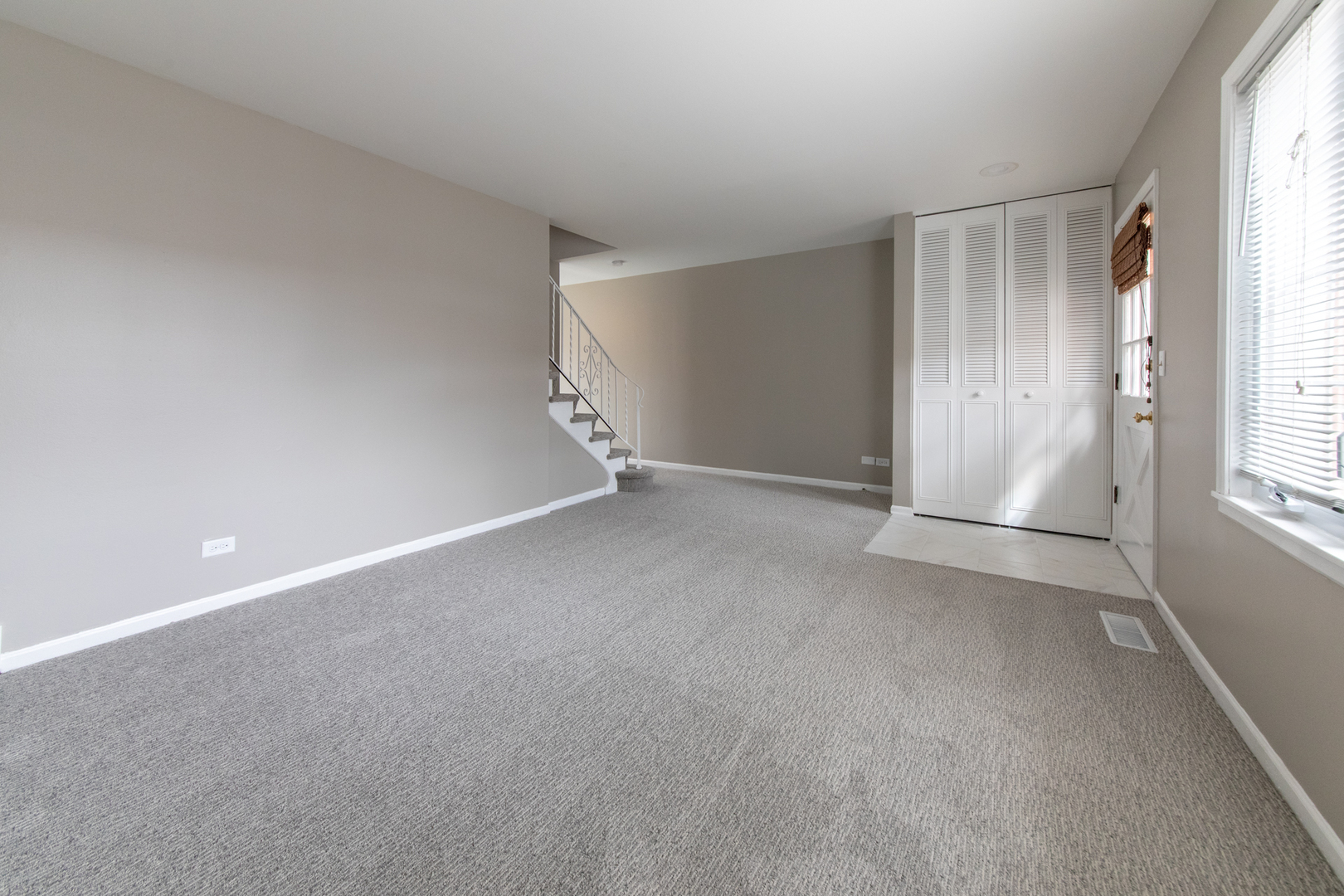 2148 Rugen Road, Unit B Glenview, IL 60026 - Photo 5 of 23 a view of an empty room with a window