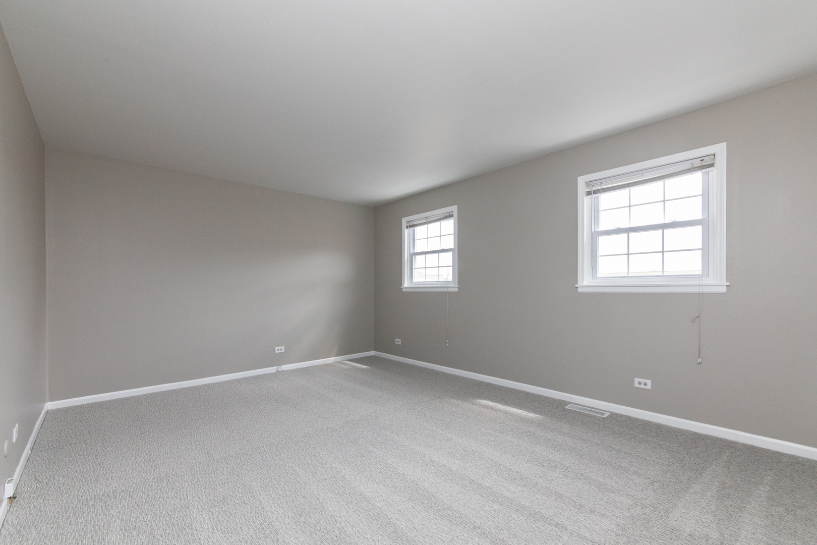 2148 Rugen Road, Unit B Glenview, IL 60026 - Photo 10 of 23 an empty room with windows