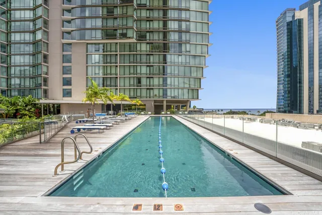 a view of a swimming pool with a patio