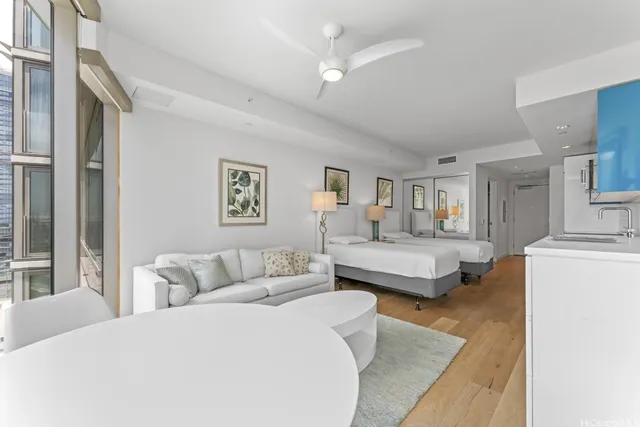 a living room with furniture and a couch