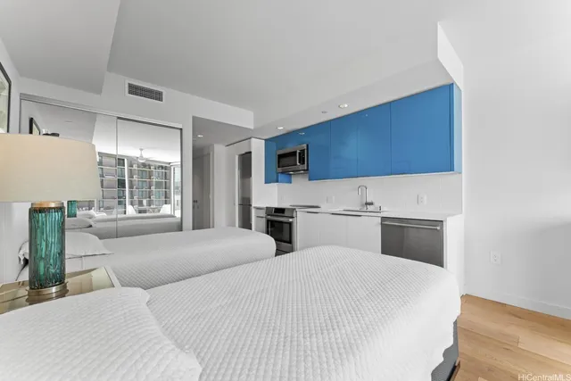 a bedroom with bed and window