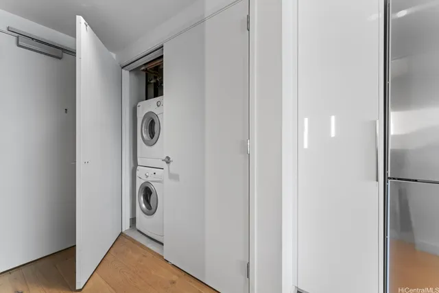 a view of a storage & utility room with washer and dryer