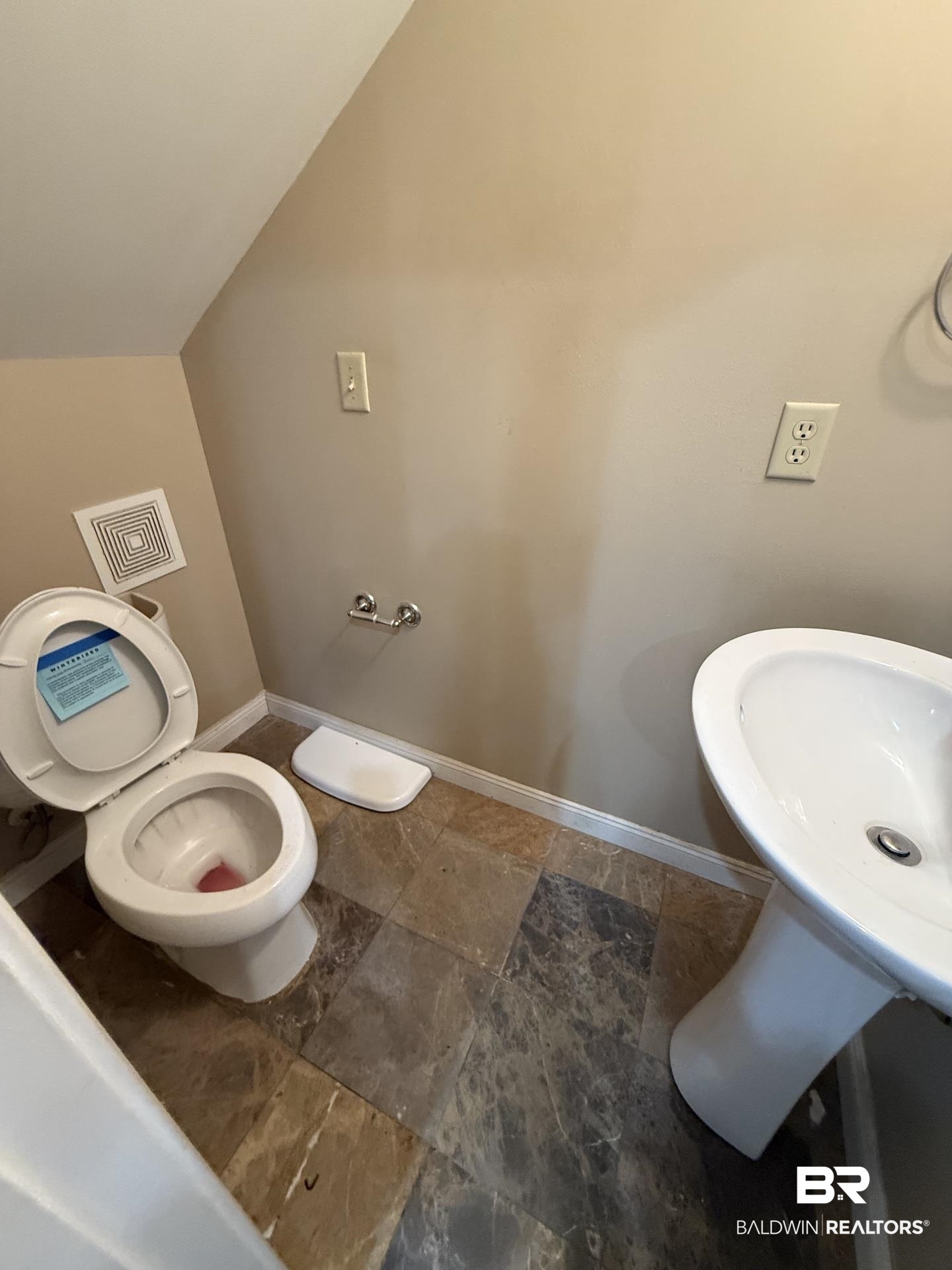 99 Cemetery Street Uriah, AL 36480 - Photo 4 of 13 Bathroom with stone tile flooring and lofted ceiling