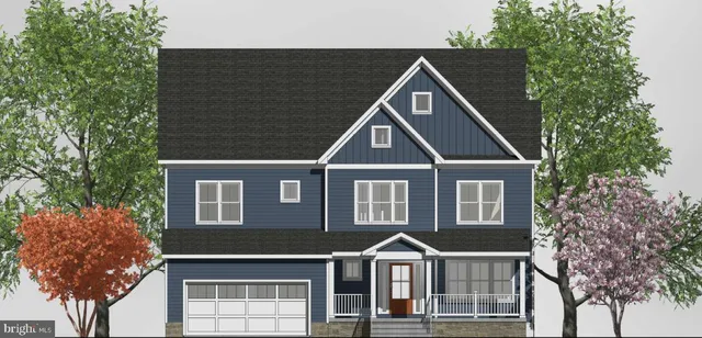 front view of a house with a trees