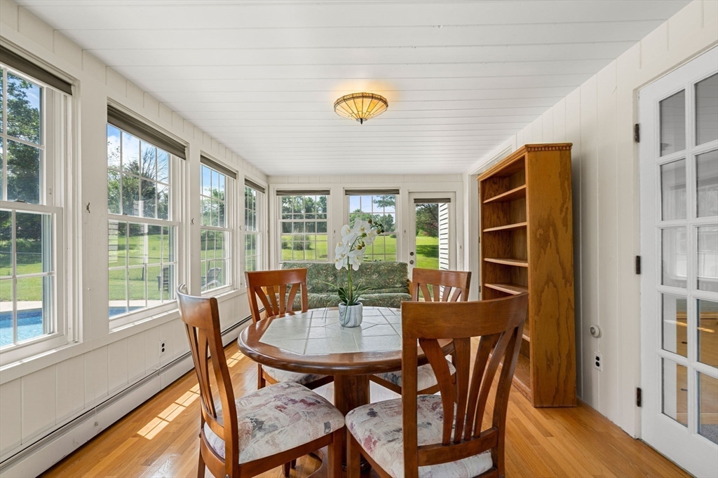 61 Turkey Hill Road West Newbury, MA 01985 - Photo 16 of 42 a view of a dining room with furniture window and outside view