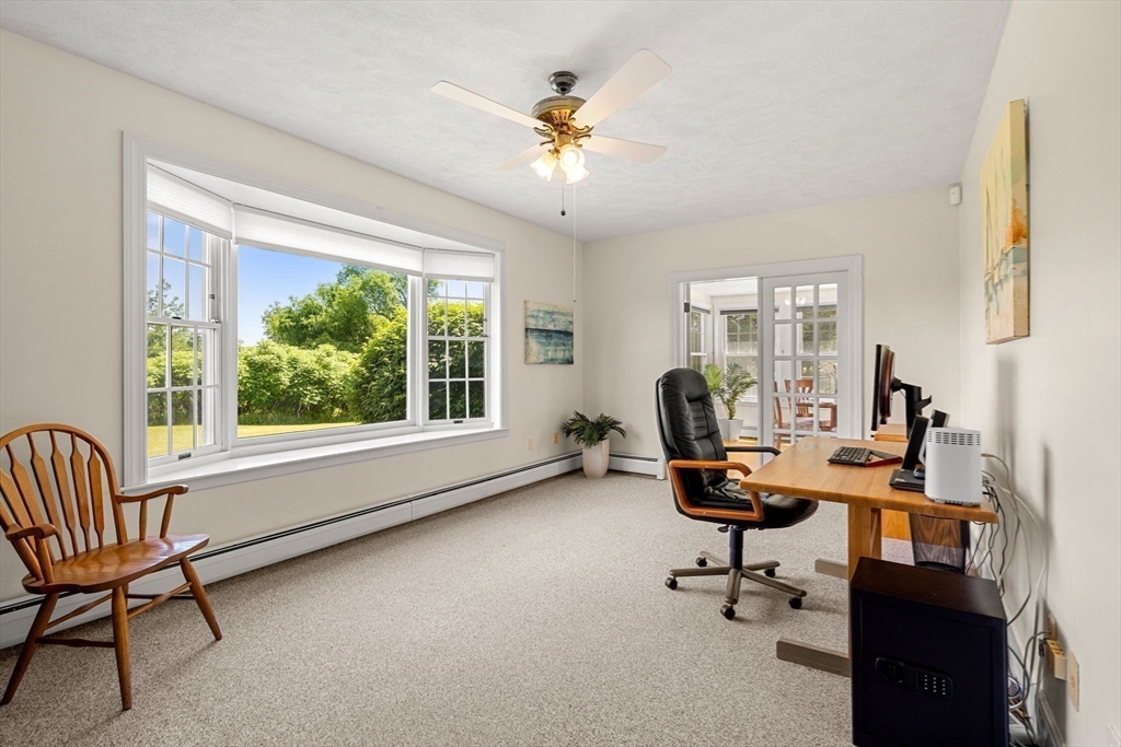 61 Turkey Hill Road West Newbury, MA 01985 - Photo 18 of 42 a view of a workspace with furniture and a window