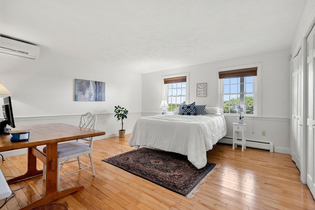 61 Turkey Hill Road West Newbury, MA 01985 - Photo 21 of 42 a bed room with a bed and a window