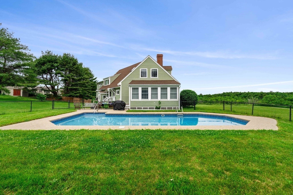 61 Turkey Hill Road West Newbury, MA 01985 - Photo 39 of 42 a view of pool with green yard