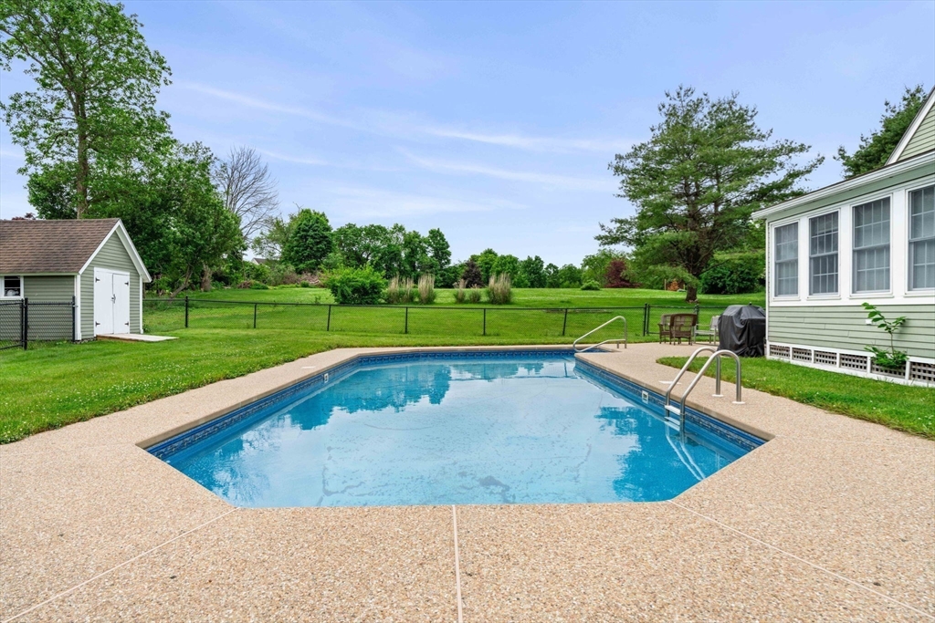 61 Turkey Hill Road West Newbury, MA 01985 - Photo 40 of 42 a view of a house with a swimming pool