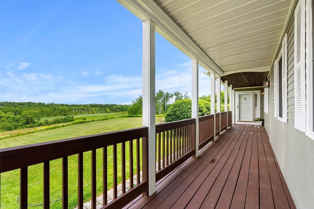 61 Turkey Hill Road West Newbury, MA 01985 - Photo 41 of 42 a view of a balcony with wooden floor