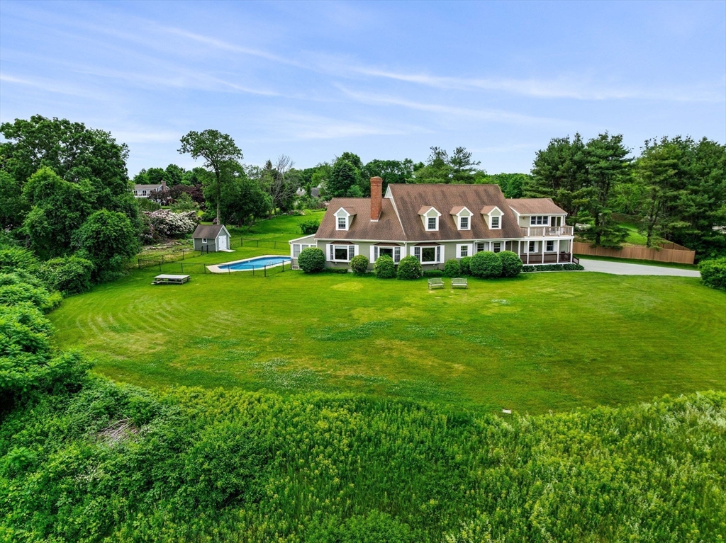 61 Turkey Hill Road West Newbury, MA 01985 - Photo 42 of 42 a front view of a house with garden