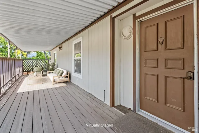 a balcony with wooden floor