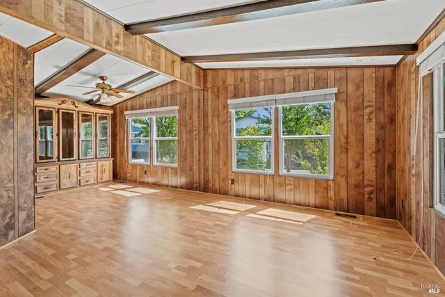 a view of a room with a large window