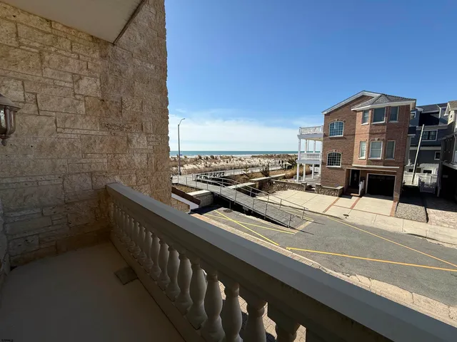 a bathroom with a tub and shower