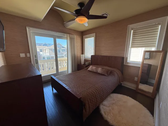 a room with lots of furniture and windows