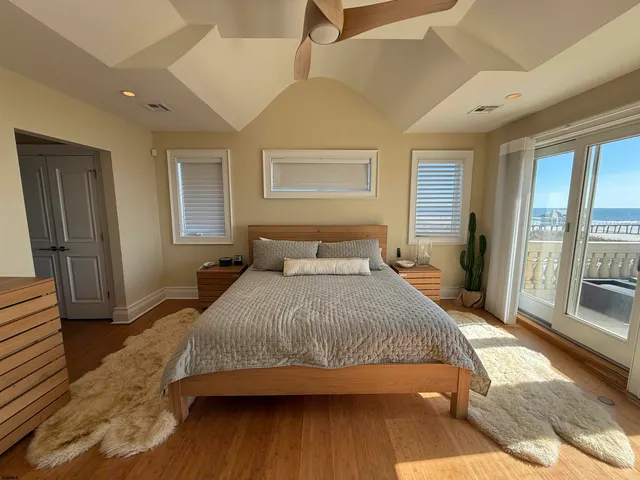 a view of a balcony with wooden floor