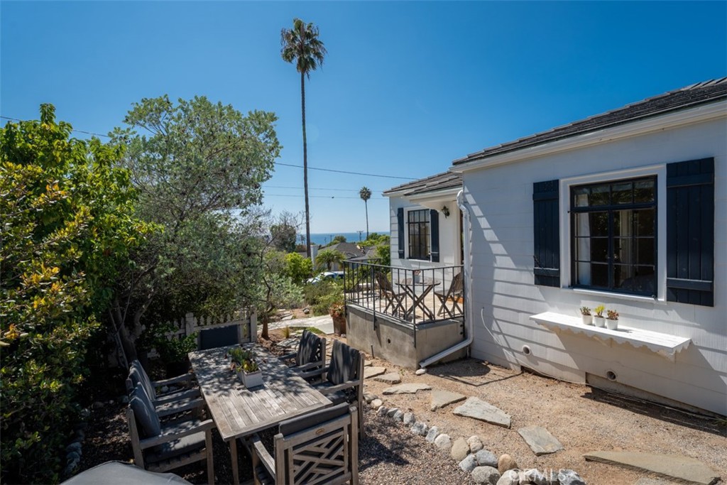 500 Mountain Road Laguna Beach, CA 92651 - Photo 15 of 36 a view of a house with backyard sitting area and tub