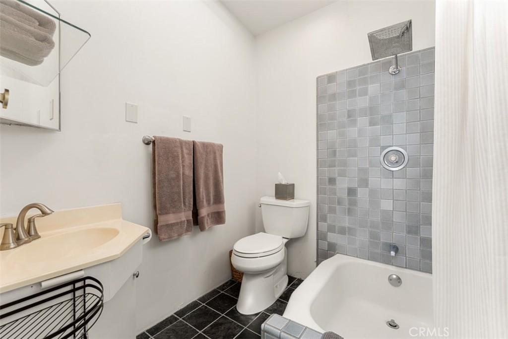 500 Mountain Road Laguna Beach, CA 92651 - Photo 27 of 36 a bathroom with a sink toilet and shower