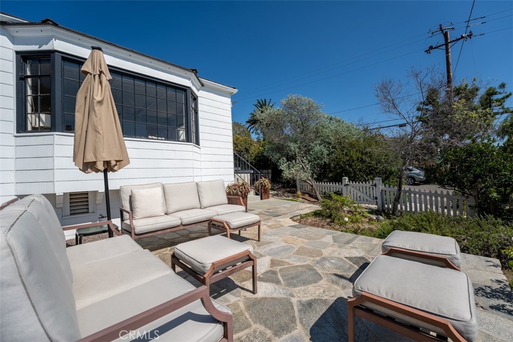 500 Mountain Road Laguna Beach, CA 92651 - Photo 33 of 36 a view of backyard of house with seating space