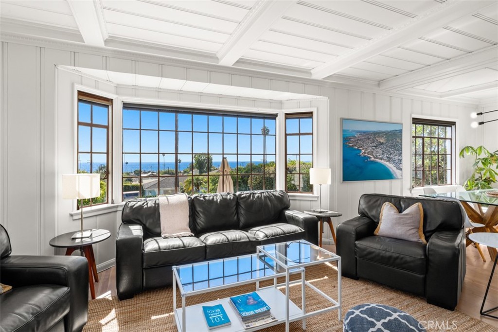 500 Mountain Road Laguna Beach, CA 92651 - Photo 5 of 36 a living room with furniture and a large window