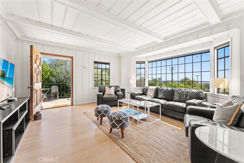 500 Mountain Road Laguna Beach, CA 92651 - Photo 6 of 36 a living room with furniture and a window