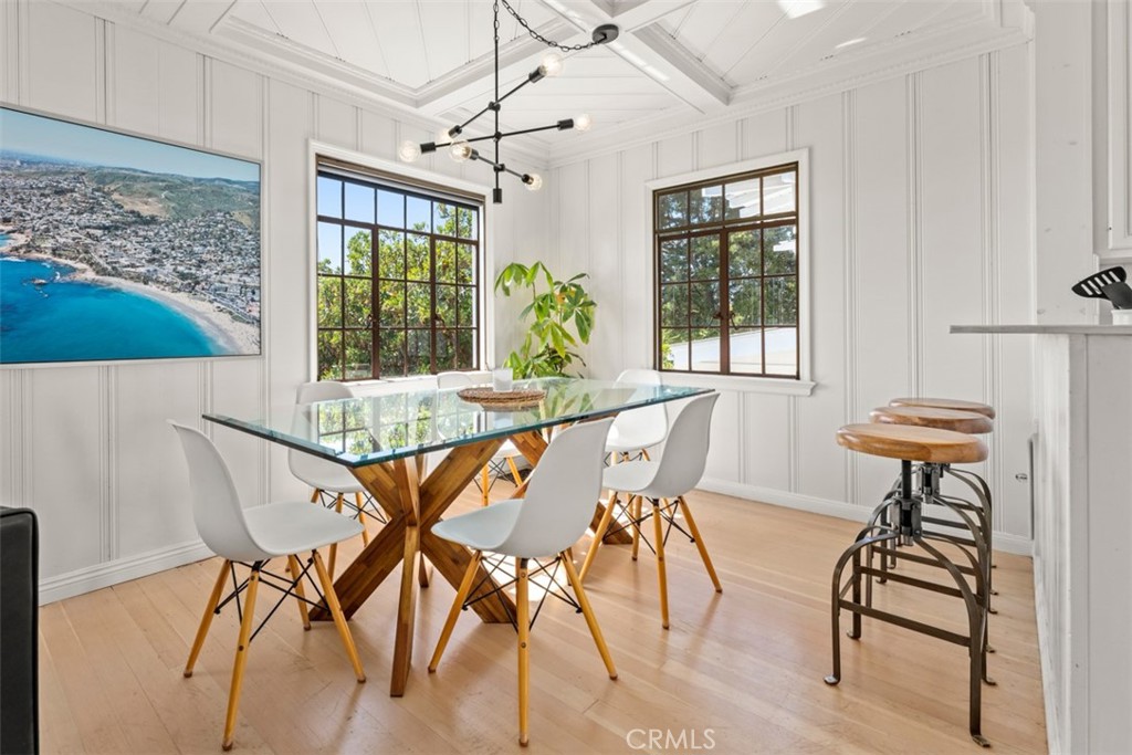 500 Mountain Road Laguna Beach, CA 92651 - Photo 7 of 36 a view of a dining room with furniture window and outside view