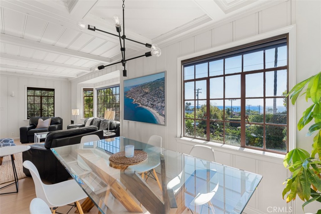 500 Mountain Road Laguna Beach, CA 92651 - Photo 8 of 36 a living room with furniture and a large window