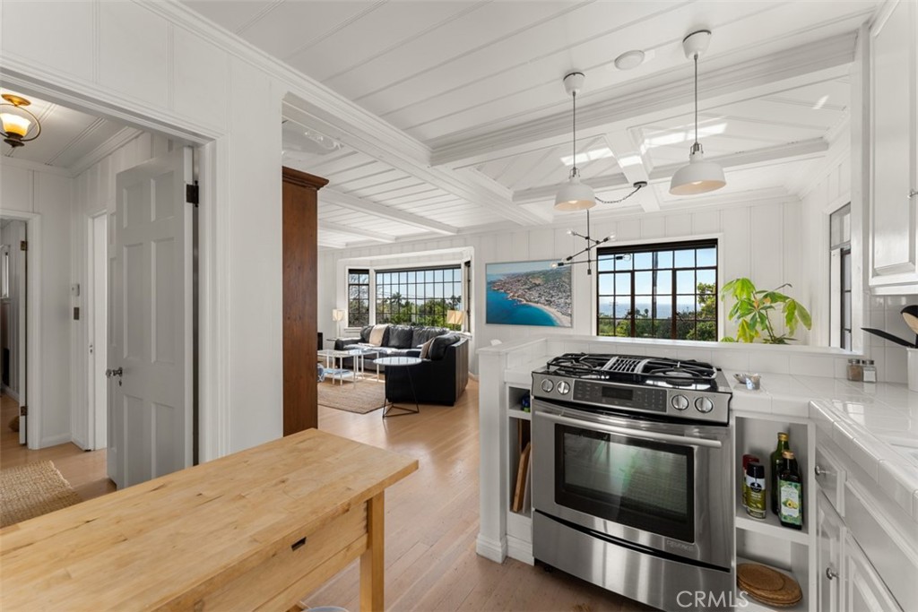 500 Mountain Road Laguna Beach, CA 92651 - Photo 9 of 36 a kitchen with a stove and a sink