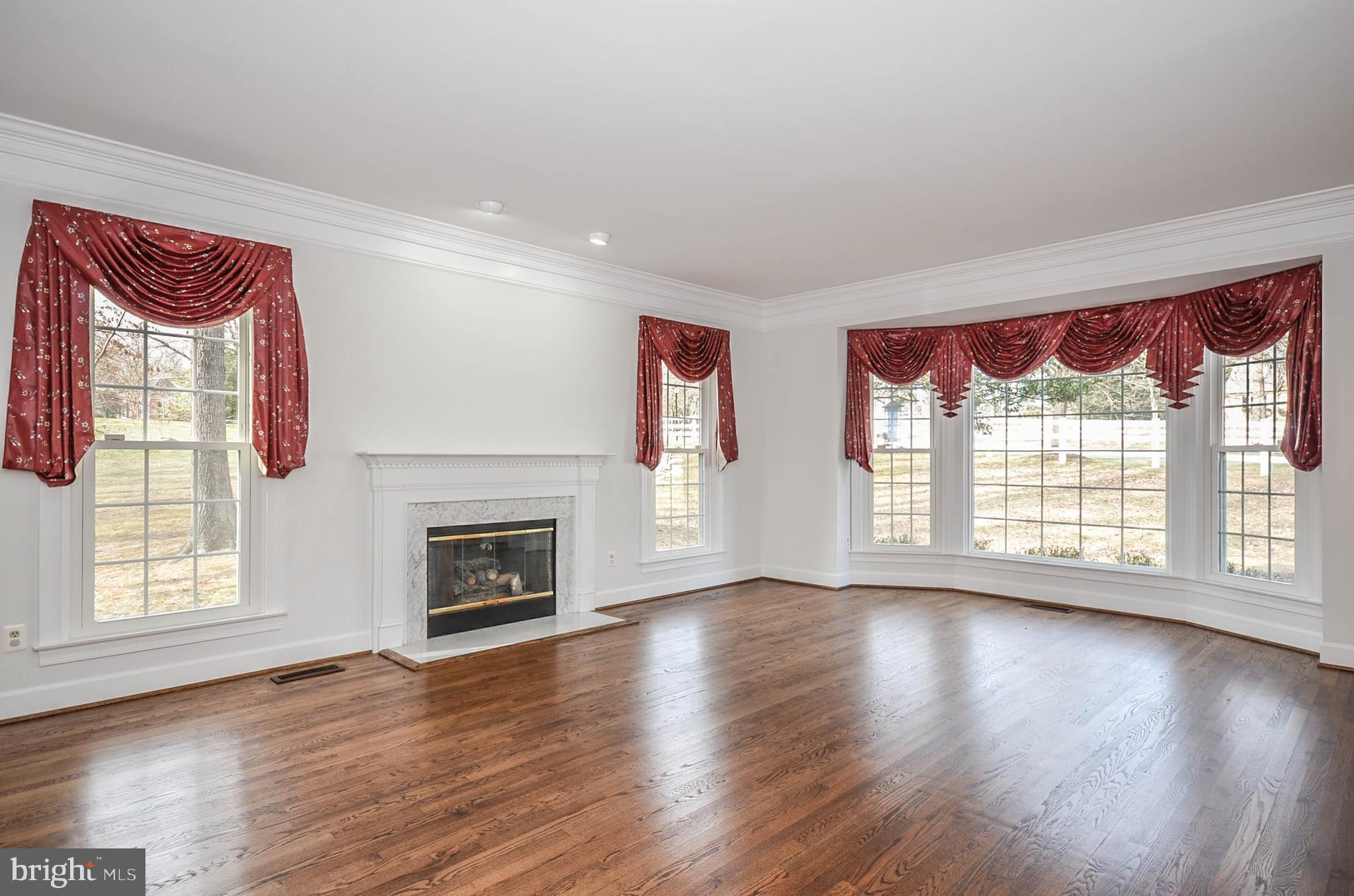 12009 Wetherfield Lane Potomac, MD 20854 - Photo 12 of 46 Dining room with fireplace