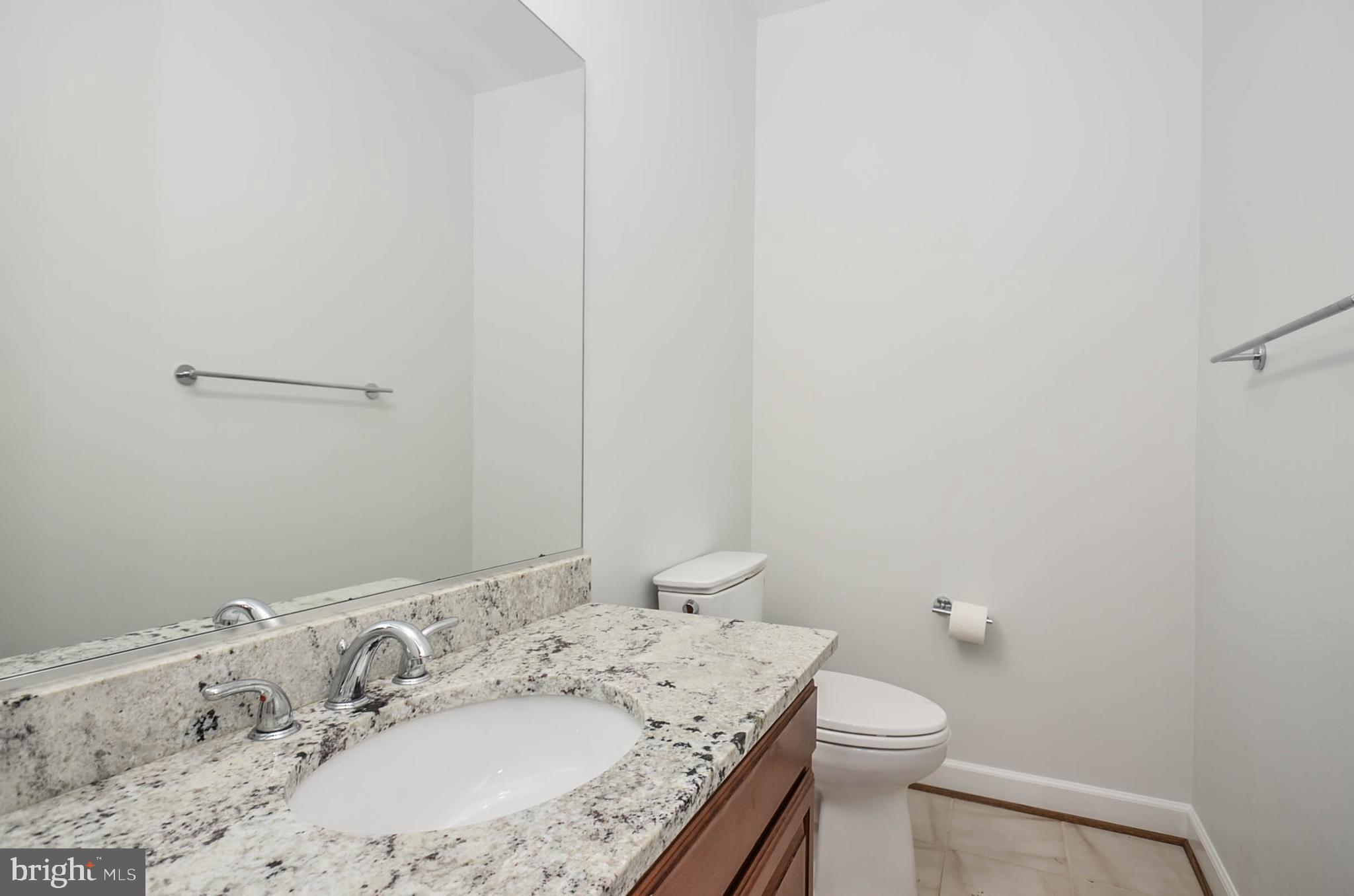 12009 Wetherfield Lane Potomac, MD 20854 - Photo 17 of 46 All bathrooms with new granite counters!