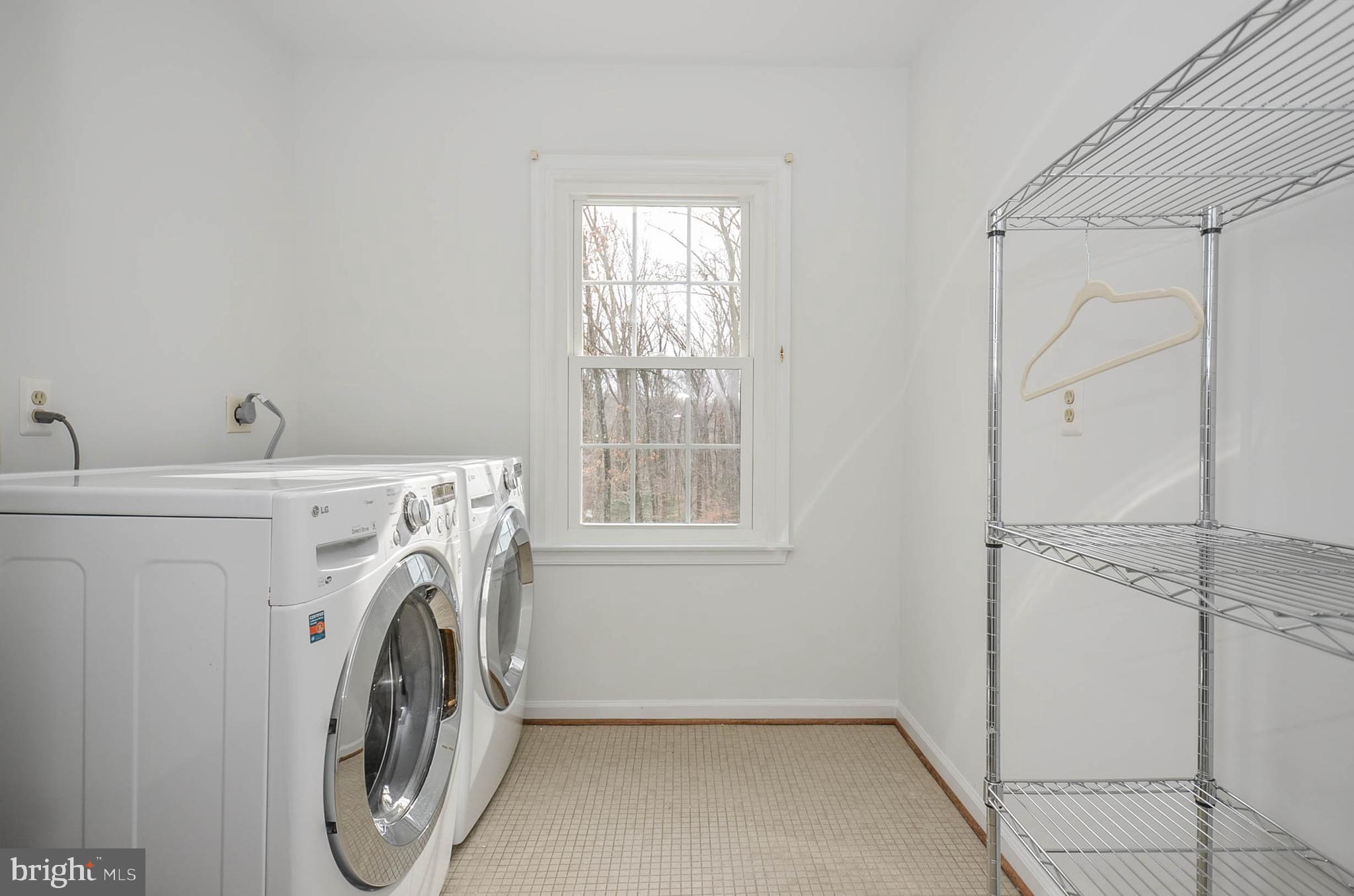 12009 Wetherfield Lane Potomac, MD 20854 - Photo 28 of 46 Laundry on top floor in its own room.