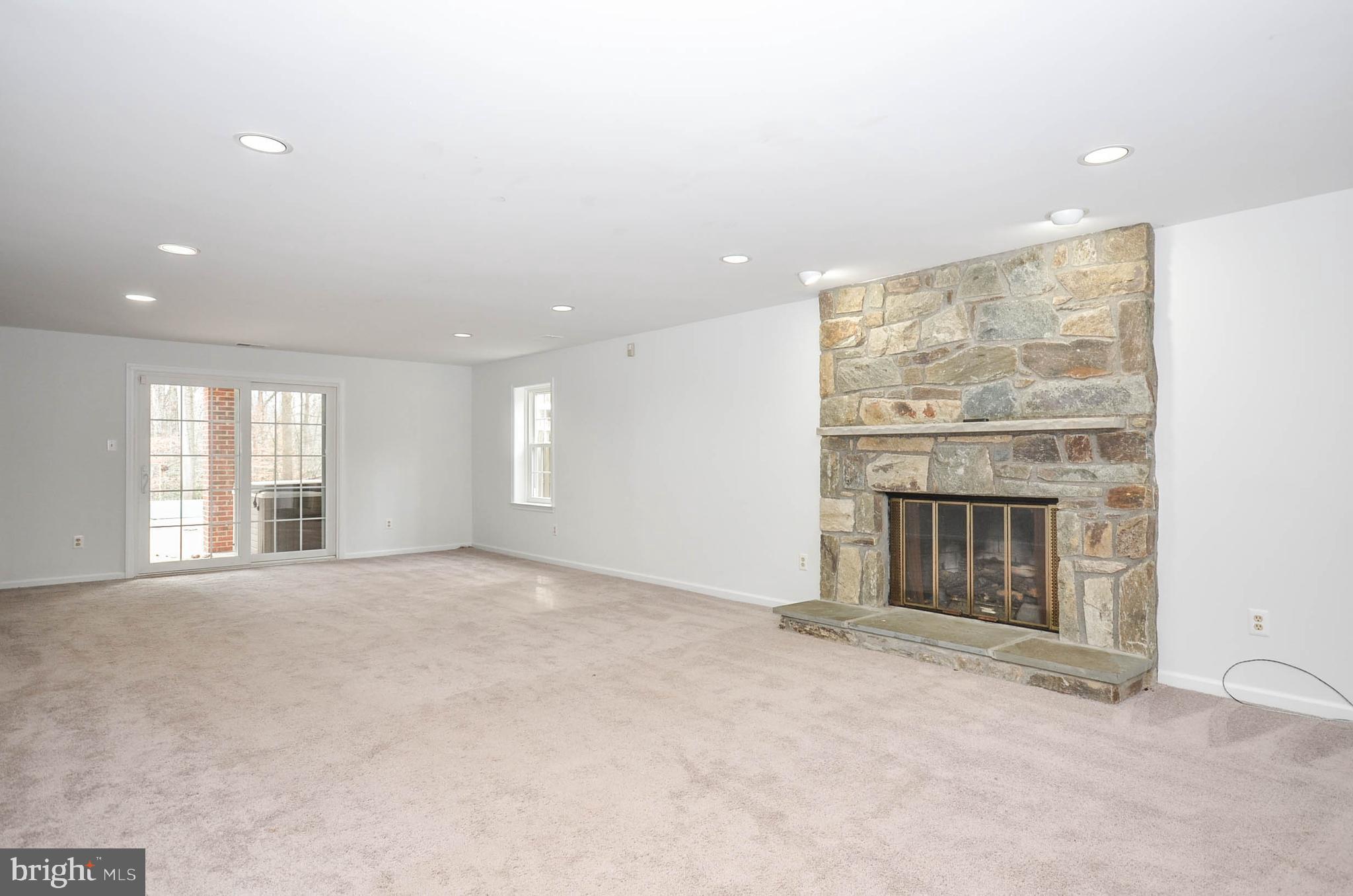 12009 Wetherfield Lane Potomac, MD 20854 - Photo 29 of 46 One of four fireplaces to make your house a home.